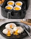 Pocherade ägg från airfryern – perfekt tillagade med rinnande gulor och möra vitar.