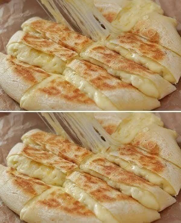 Bröd med smulad ost och vitlök: den perfekta frestelsen att dela